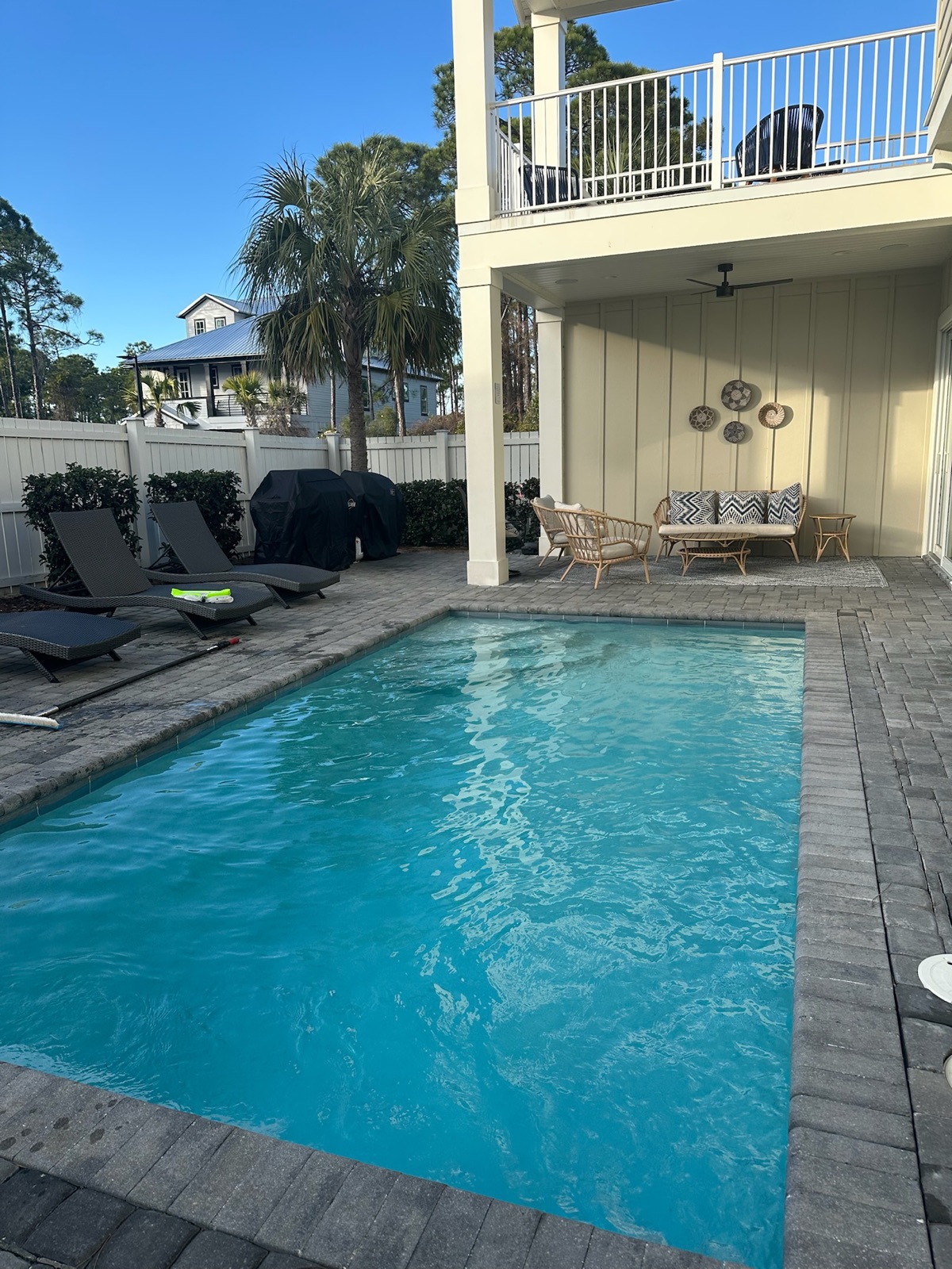 Clear residential pool and deck maintained by WittCo Pools in Miramar Beach, Florida